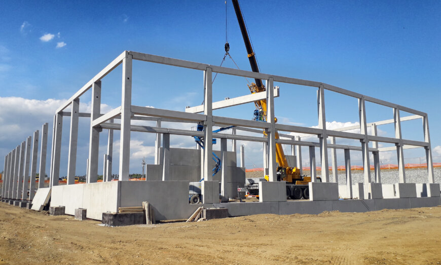 Outside view of hall construction with crane Outside view of hall construction with crane